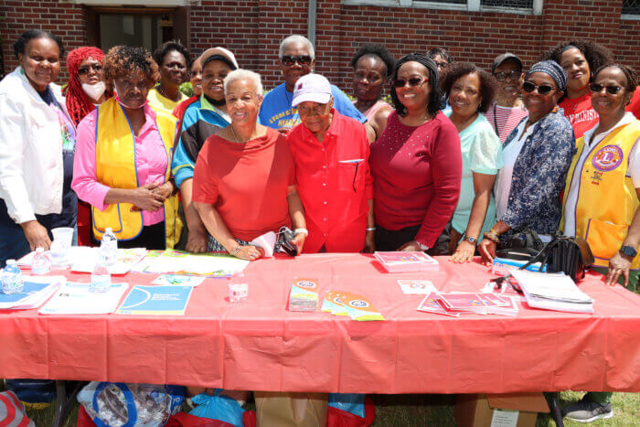 Dr. Illouise Murillo-Tucker, far left, front row, with members of Vanderveer Park United Methodist Church and Vanderveer Cares Committee at health fair.