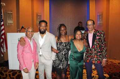 Founder of Calvary's Mission Food Pantry ,Tony Singh, left, next to Kevin Sookdeo, Diandra, Nadia Sookdeo, and Roger Gary, at Calvary's Mission Food Pantry 2nd Annual Fundraising gala at Terrace on the Park, to raise funds to combat food insecurity. 