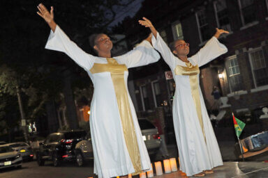The Stukes sisters, Janessa, 16, left, and Jaydah, 17, perform liturgical dance to loud applause.
