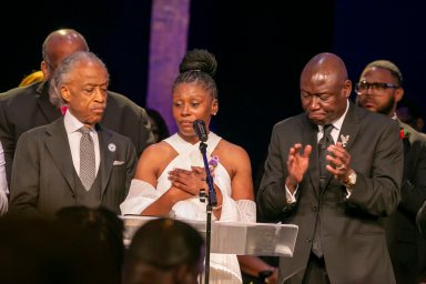 Pamela Dias, the mother of Ajike Owens, center, makes a statement with Rev. Al Sharpton, left, and Attorney Ben Crump, right, during the funeral for Owens on Monday, June 12, 2023, at Meadowbrook Church in Ocala, Fla.