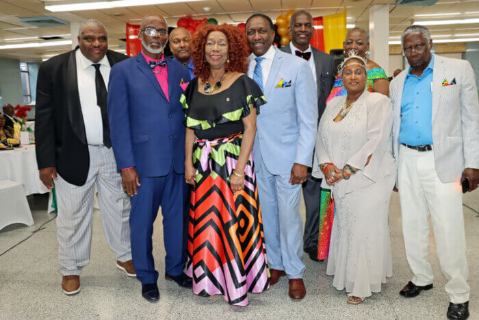 Commissioner David Williams, center, with organizing committee members.