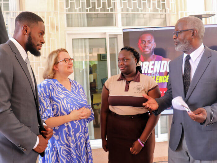 Engaging in conversation at the launch event for Rodney's Life Beyond Sports Foundation and Scholarship Awards on May 30, 2023, at the Official Residence of Canada are (from left) Canadian Olympian Brendon Rodney, Canadian High Commissioner Emina Tudakovic, Scholarship Recipient Shantel Monroe, a 2nd Year Student at GC Foster College, and Denzil Thorpe, Permanent Secretary in the Ministry of Culture, Gender, Entertainment and Sport.