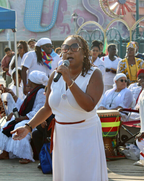 CJ Empress Poetry Lane’s poem “Join Hands with Me” was well received at the 34th Annual Tribute to the Ancestors on the Coney Island boardwalk, on June 10.