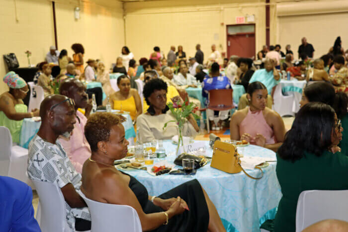 Appreciative audience, with former Speaker of the House of Assembly in St. Vincent and the Grenadines, Jomo Thomas, left, front table, taking in the jazz music.