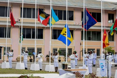 Members of the Trinidad and Tobago Defence Force raise the flags of CARICOM nations during a flag raising ceremony at the Convention Centre in Chaguaramas, Trinidad and Tobago, Tuesday, July 4, 2023. Tuesday marks the 50th Anniversary of the signing of the Treaty of Chaguaramas, which established the Caribbean Community, CARICOM.
