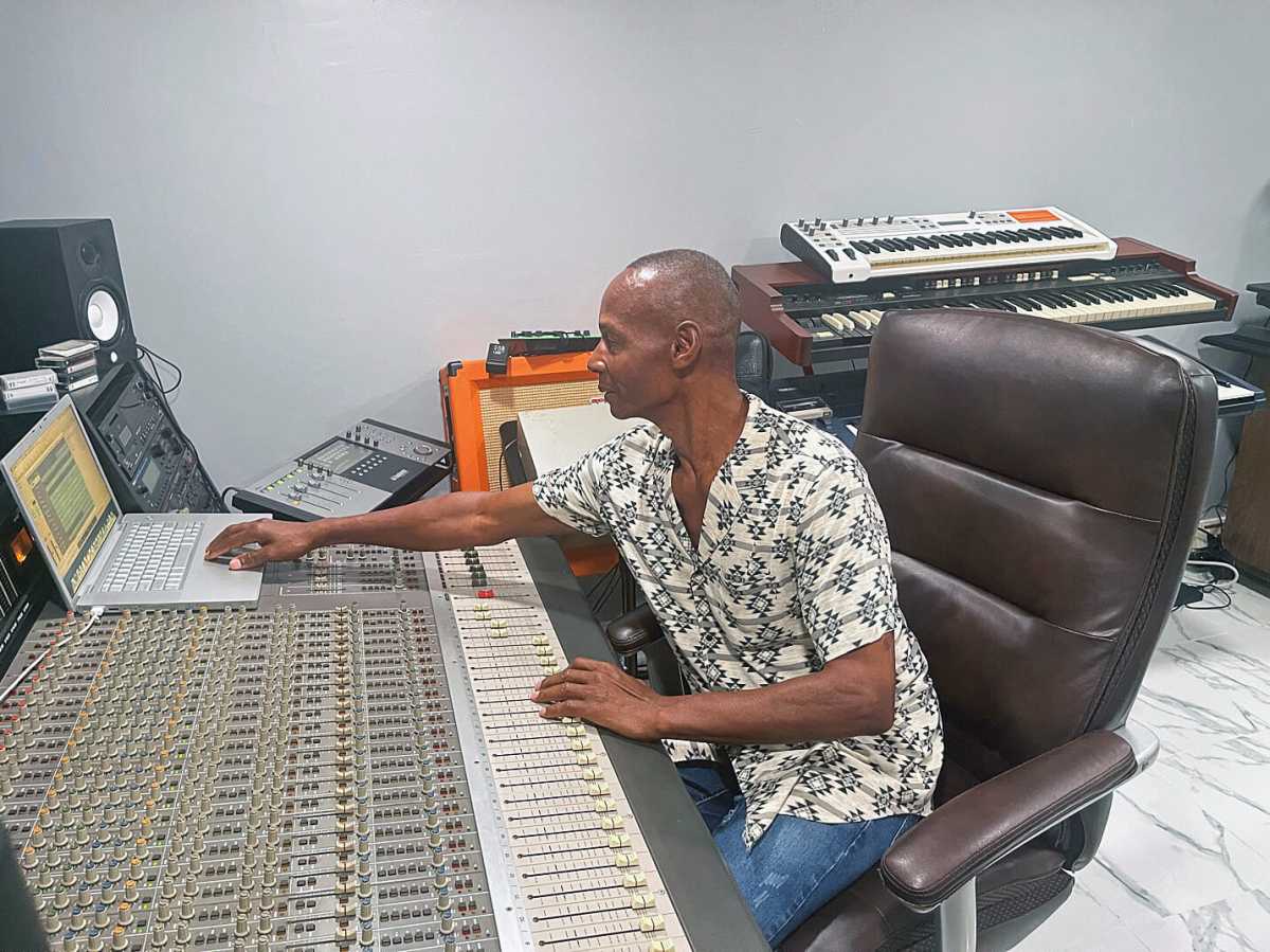 Vincentian musician Joe Alert at work in his home studio.