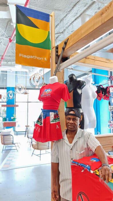 Barbadian-born Selwym, an original vendor showcases his merchandise at his Flagathon 1 store at the Flatbush Central Caribbean Marketplace, at the intersection of Flatbush (Dr. Roy Hastick Way) and Caton Avenue, Brooklyn.