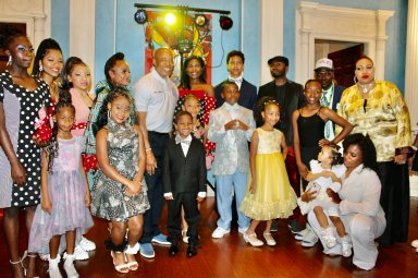 Mayor of the City of New York, Eric Adams surrounded by the adorable and confident models and organizers at the first NY Kids Fashion Weekend and the first ever fashion event held at Gracie Mansion.