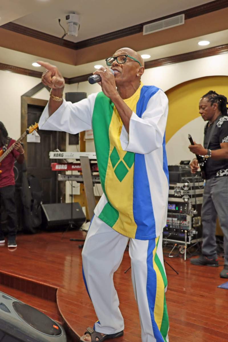 Rejector urges nationals to "Use The Anthem" in competing the preliminary round of the judging of the Dynamite Calypso Tent at The Palace on Nostrand Avenue in Brooklyn for Vincy Mas 2023. 