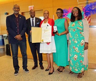 Justice Wavny Toussaint, center, holds the proclamation from Brooklyn Borough President Antonio Reynoso. Others in photo, from left Trinidad and Tobago Consul General Andre Laveau, Howard University President Dr. Wayne A.I. Frederick, Hon. Dena Douglas and Hon. Edwina Richardson-Mendelson.