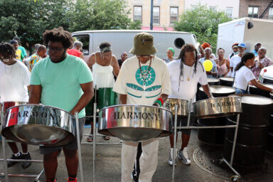 Harmony Steel Orchestra beats out soca vibes during the launch of 2023 J'Ouvert in Brooklyn on Saturday, July 22.