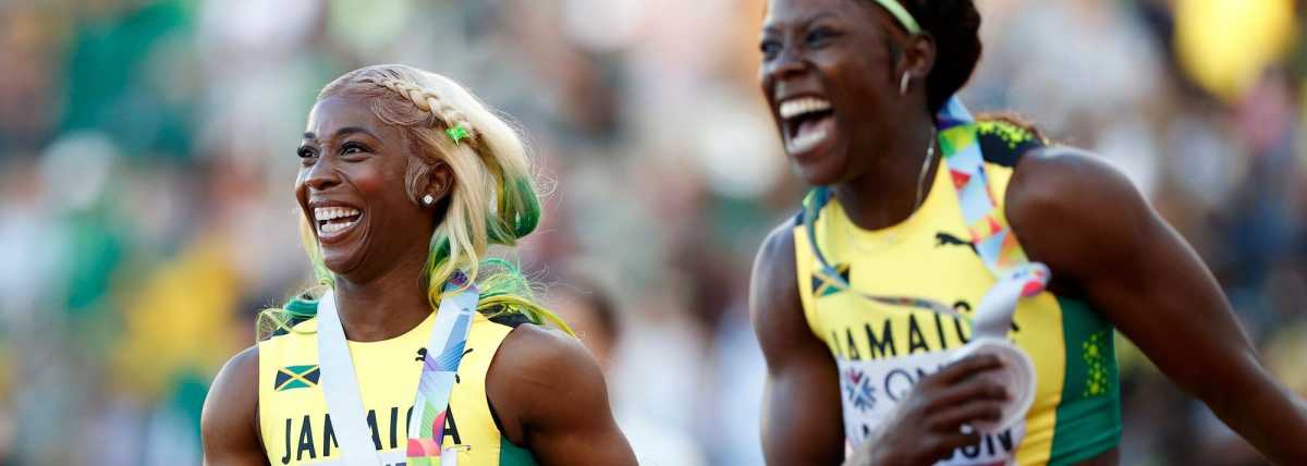 Defendng champions Fraser-Pryce, left, and Jackson