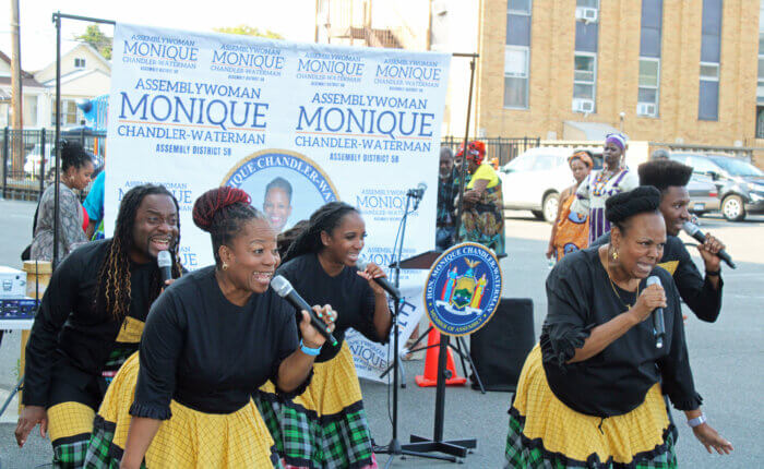 The popular Braata Folk Singers, with founder Andrew Clarke (far left) wows the crowd during their performance at the first Folk Festival in the community, on Holy Family Church grounds.