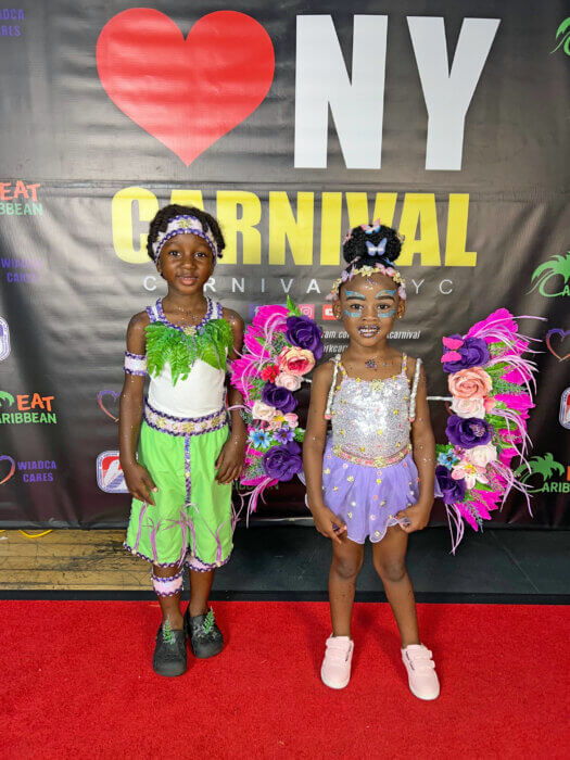 Nathaniel Rodriguez,(left), wears a backline costume entitled ‘Green in the Garden' and Kai’lan-Wisdom Rodriguez Debrosse, dons a midline costume, 'Fairy in the Garden.’