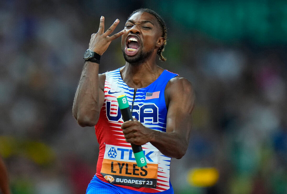 Noah Lyles, of the United States, celebrates anchoring his team to gold in the Men's 4x100-meters relay final during the World Athletics Championships in Budapest, Hungary, Saturday, Aug. 26, 2023.