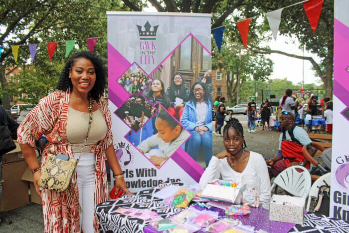 Marcelle Lashley-Kabore, of Guyanese and Trinadian ancestry, showcases her products to promote financial literacy and entrepreneurship, at the 16th Annual Back-to-School Harvest Fest hosted by Sen.Kevin Parker at Paerdegat Park in the 21st Senate District, Brooklyn on Aug. 26 2023.