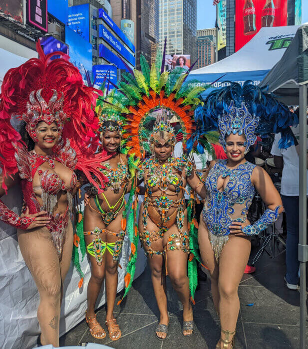 Masqueraders from Kaios International and Dance Brazilian.