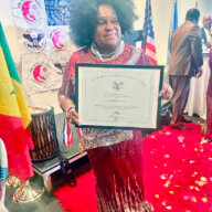 Lady Ira Lewis proudly displays her Global Peace Ambassador certificate from the Institute of Public Policy and Diplomacy Research, at the Scandinavian House on Park Avenue in Manhattan, part of the United Nations General Assembly (UNGA) Diplomacy of Excellence initiative.