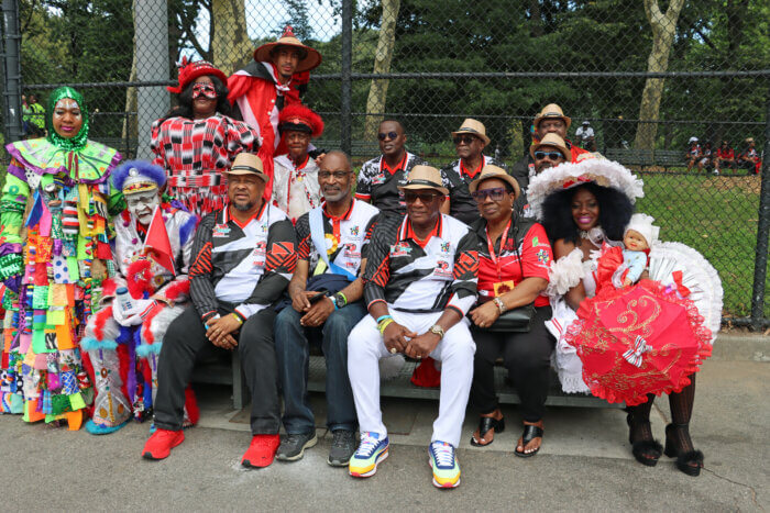 Trinidad and Tobago Consul General Andre Laveau, seated third from left , with Winston "Gypsy" Peters, fourth from left, and members of the Trinidad and Tobago National Carnival Commission on their maiden participation in the West Indian-American Day Carnival Parade.