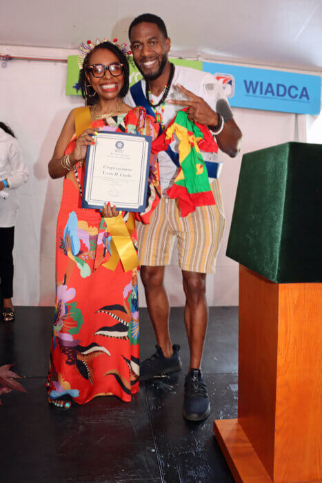 US Rep. Yvette D. Clarke, a Grand Marshal, displays proclamation with New York City Public Advocate Jumaane Williams.