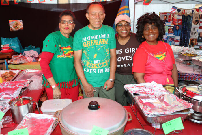 Lamarcia Sandra Pankin, third from left, heads the Grenada booth.