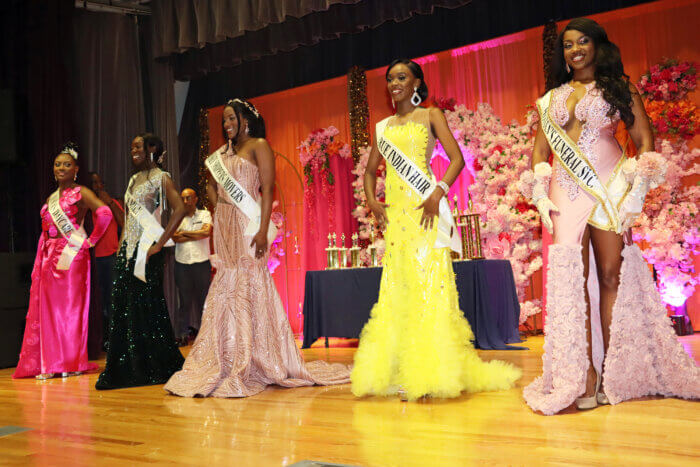 Contestants on stage before the crowning of Miss Grenada USA.