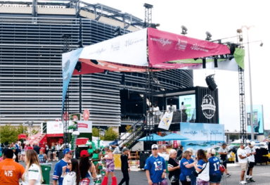 US Virgin Islands Kicks-Off New York Jets Partnership with Carnival Themed Tailgate Activation