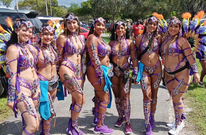The beautiful revelers show off intricately designed costumes from Ka Paya Mas during Miami Caribbean Carnival in Dade County, on Oct. 8, 2023.
