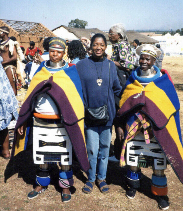 Brooklyn artist Reba Joyce Ashton-Crawford with Ndebele women.
