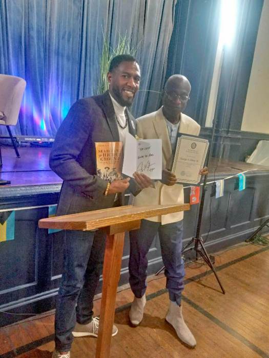 Public Advocate Jumaane Williams (lef) with Grenadian author George Glean, Sr.