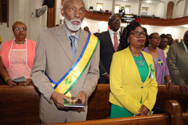 COSAGO President Crispin Friday and Vice President Laverne McDowald-Thompson in front pew.