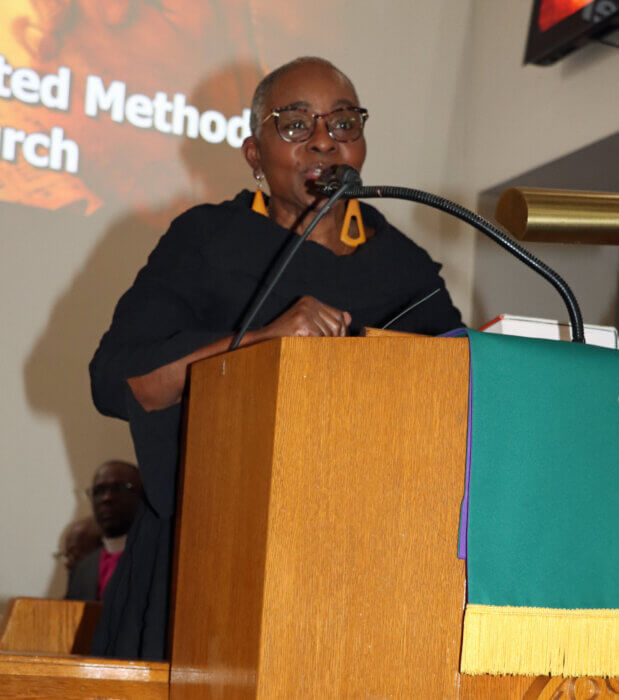 Erlene Williams-King addresses congregation on behalf of St. Mark's United Methodist Church.