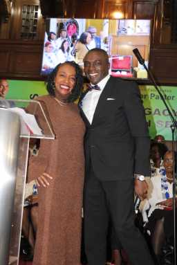 Congresswoman Yvette D. Clarke congratulates Rev. Dr. Clive E. Neil during his 35th Anniversary Pastoral Service at Bedford Central Presbyterian Church in Brooklyn.