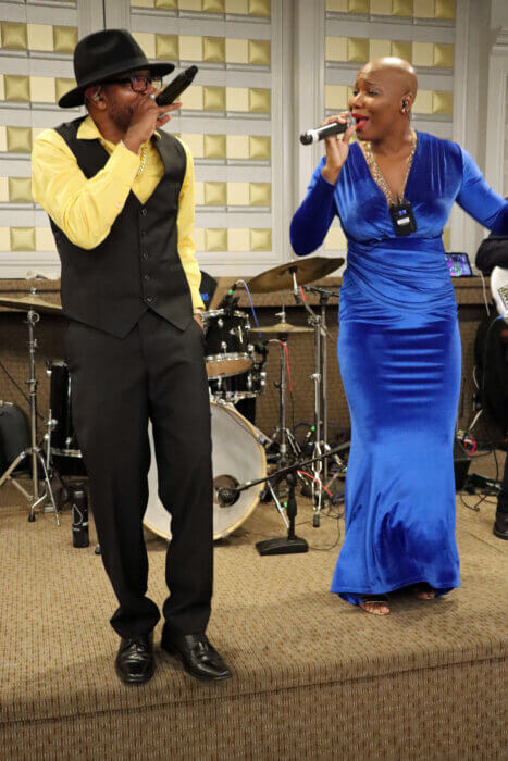 Lead singers Deuel Anderson and Chanique Rogers upfront during D Magma Band's performance at the SVG 44th Independence Anniversary Ball at Russo's on The Bay.