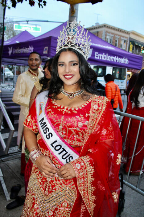 Miss Lotus 2023 Saleena Ram wearing a bejeweled sari, served as co-emcee at the Annual Diwali Festival in Richmond Hill, Queens.