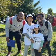 Brothers Christian Georges (left) and Gaetan Georges (right), with two of the students they coach at NYJTL.