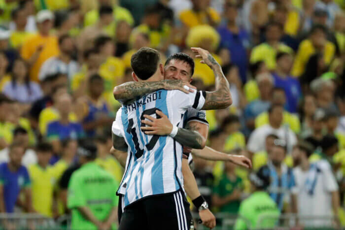 Argentina's Nicolas Otamendi, left, celebrates with teammate Enzo Fernandez after scoring his side's opening goal against Brazil during a qualifying soccer match for the FIFA World Cup 2026 at Maracana stadium in Rio de Janeiro, Brazil, Tuesday, Nov. 21, 2023.