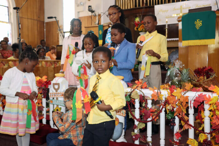 Sunday School children make their presentation.