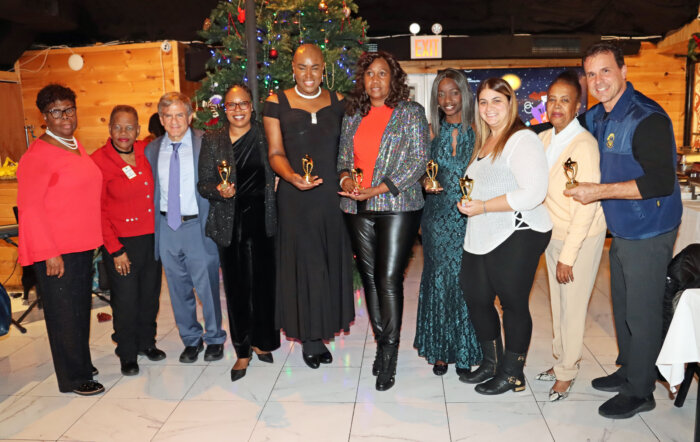 Honorees and officials with Brooklyn Canarsie Lions President Jean Joseph, far left.