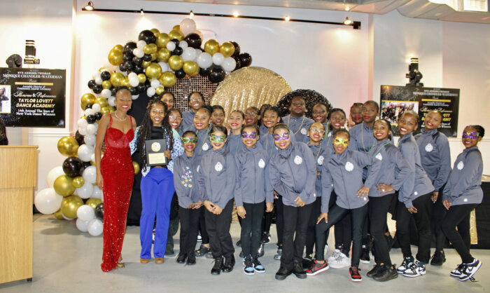The Taylor Lovett Dance Academy, star winners of the New York Dance competition with Assemblywoman Monique Chandler Waterman (left) after being presented with a plaque at the 2nd Annual AD 58 Community Awards ceremony at the Top Civic Center, in Brooklyn, on Dec. 3.