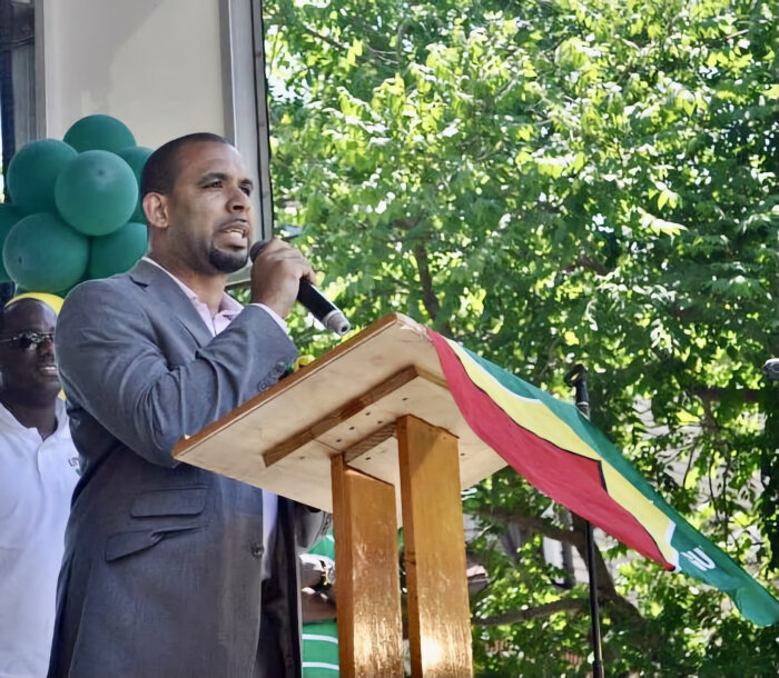 Cory Provost, former 58th Assembly district leader, and newest New York attorney-at-law, addressing a past Guyanese audience in Brooklyn.