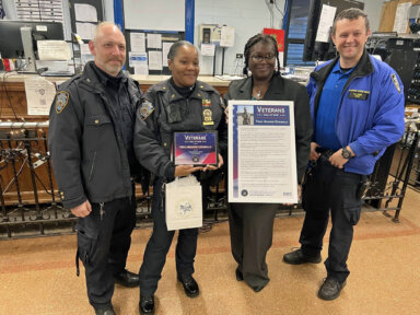 From left, Officer Michael McGlynn (63 PCT.), Detective Navarro-Caraballo (63 PCT), Sen. Roxanne Persaud, and Officer Podd (63 PCT).