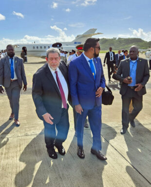 St. Vincent and the Grenadines Prime Minister Ralph Gonzales (left) with Guyana’s President Irfaan Ali at the Argyle International Airport in St. Vincent.