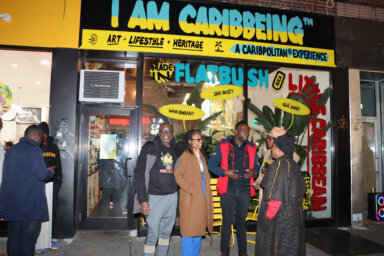 Assemblywoman Monique Chandler-Waterman, second from left, with patrons outside I AM Caribbeing HQ.