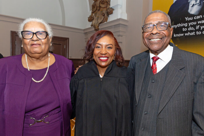 Guyanese-born Justice Sharon Bourne-Clarke, center, with her parents, Chesterfield and Eileen Bourne, at induction ceremony.