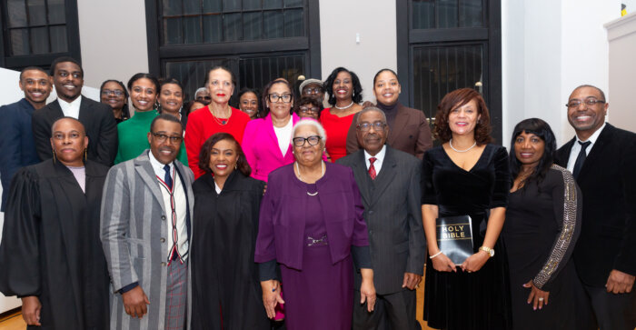 Family photo: Justice Sharon Bourne-Clarke, third from left, front row, with her husband, Chester, to her right, her parents to her left, Justice Wavny Toussaint, left, front row; and family members.