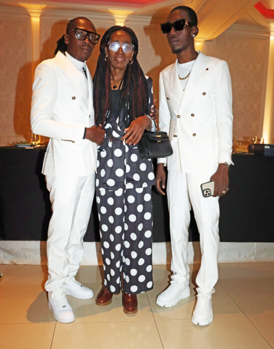 Delroy "Fireman" Hooper, left, with his mom, Eltina Hooper, and younger brother, Mackell Hooper.