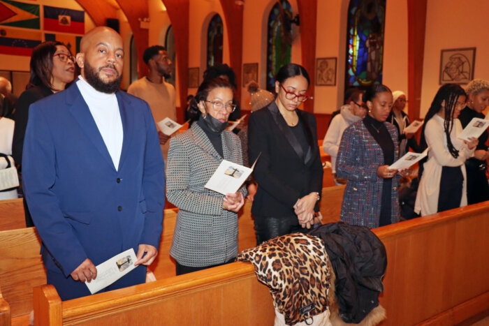 Bonnie Browne's son, Damany, left, and other other members of the Browne family in front pew.