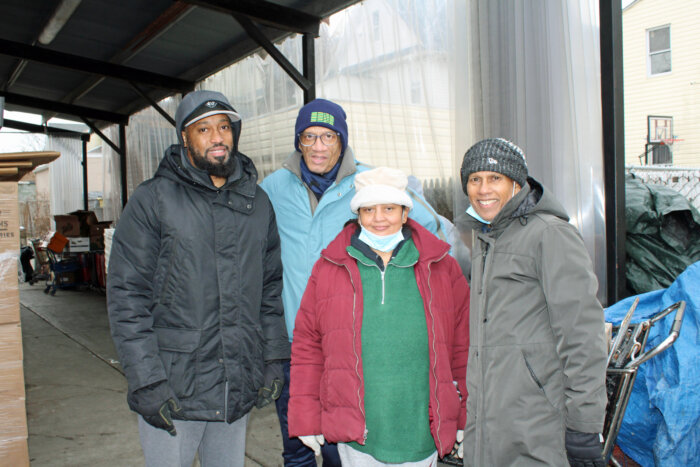 The management and board of Calvary's Mission Food Pantry in Richmond Hill, Queens run a swift shift every Saturday serving hundreds of migrants and residents through long lines. They line-up early in the morning for groceries to feed their families. From left, Kevin Sookdeo, Roger Gary, Sister Felicia, and founder, Tony Singh, on Jan. 6.