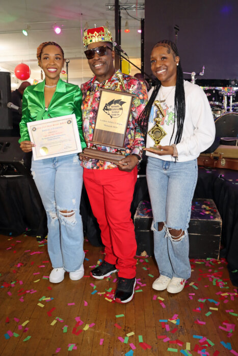 Hercules with his wife, Shenell Williams, and their daughter, Chloe, after winning the crown.